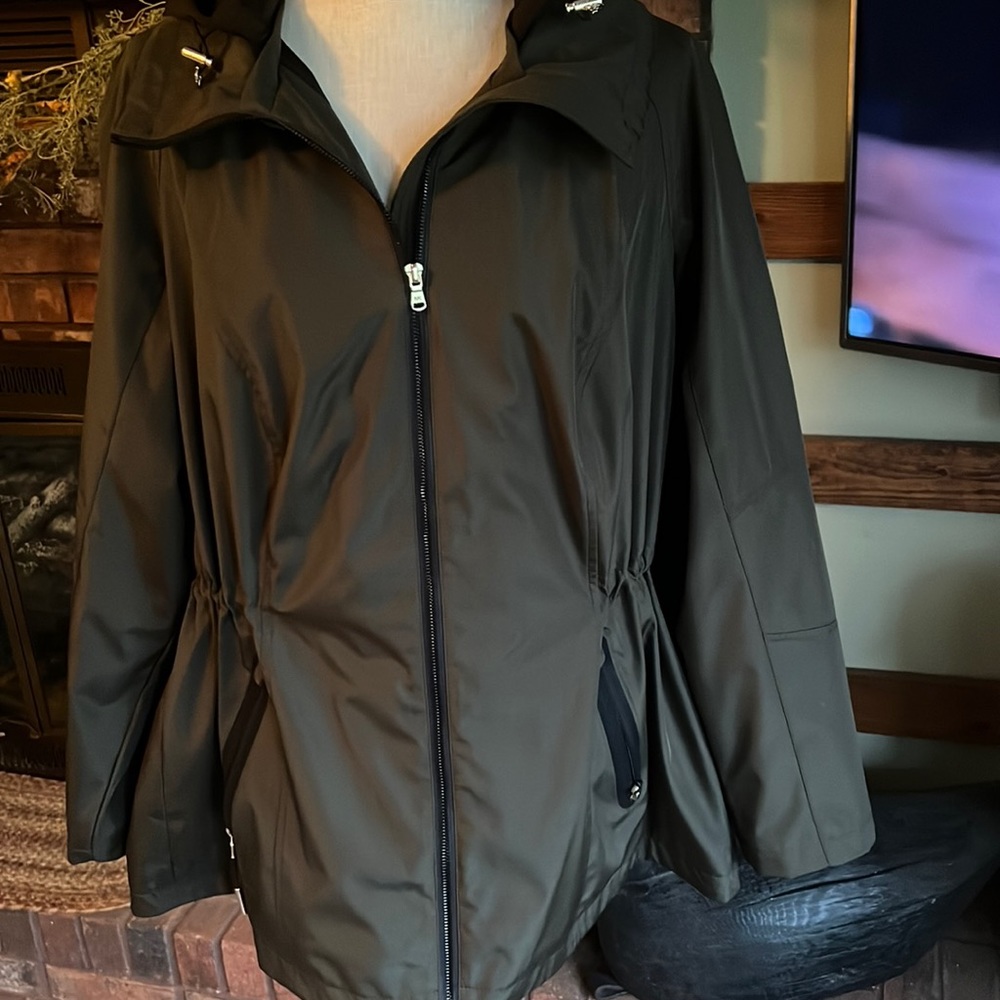Never wore. Michael Kors Fall Rain Jacket. Lightly lined. Olive.Adjustable waist
